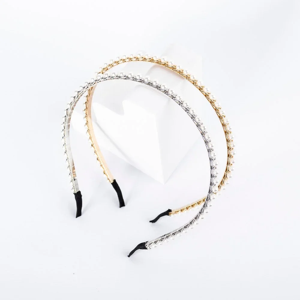 VINCHA CON PERLAS ENROSCADAS